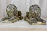 Pair of antique French lion sculptures in bronze