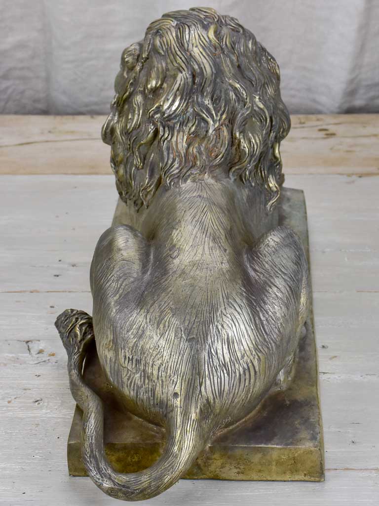 Pair of antique French lion sculptures in bronze