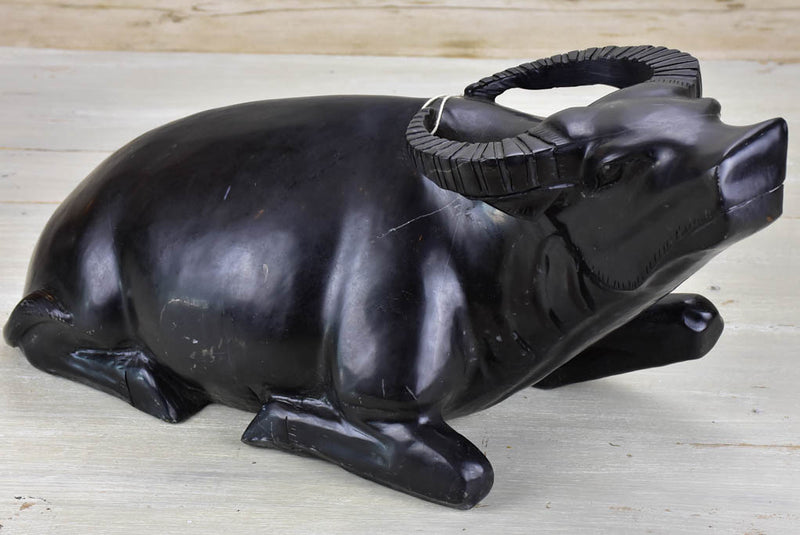 Black marble sculpture of a buffalo
