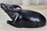 Black marble sculpture of a buffalo