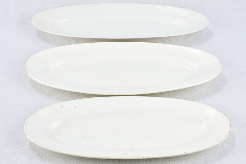 Three oval platters, Limoges & Bordeaux 23¾"