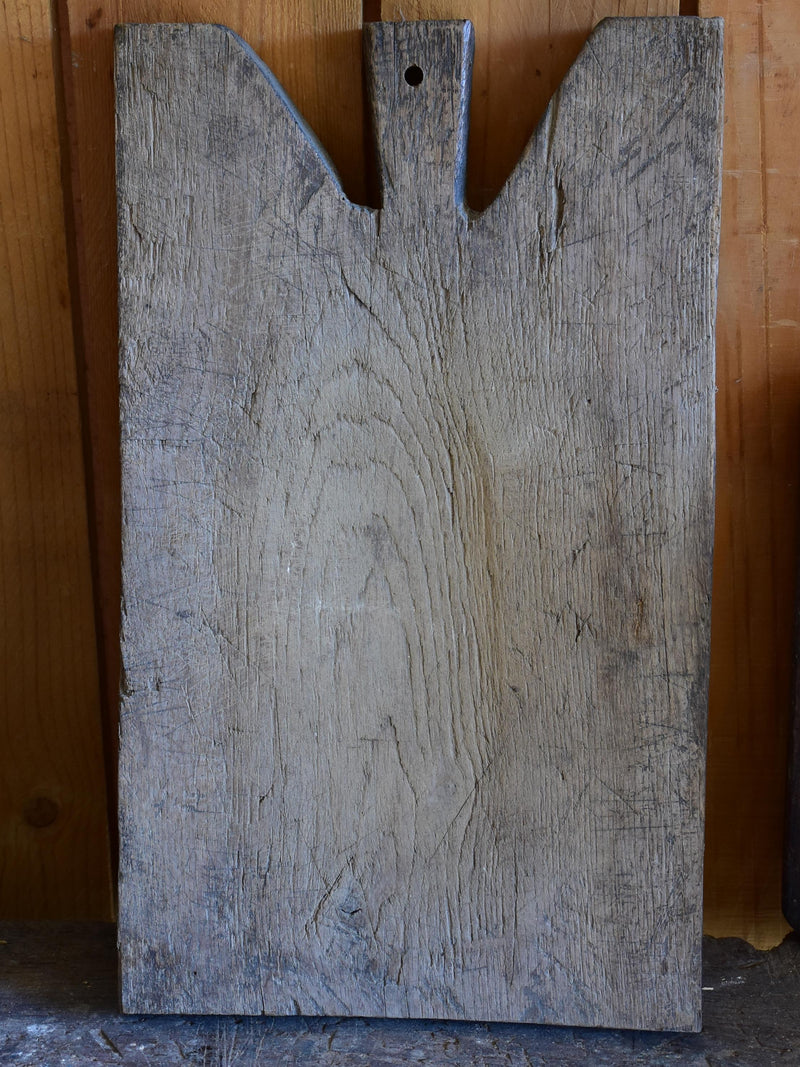 Antique French cutting board with weathered grey timber