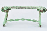 Antique garden footrest with green patina