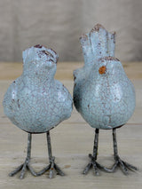 Two artisan made bird sculptures