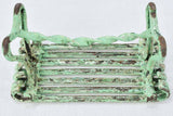 Antique garden footrest with green patina