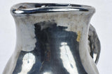 Vintage ceramic pitcher with black glaze