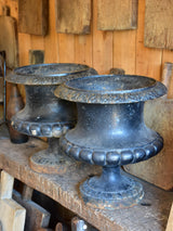 Pair of black antique French garden urns