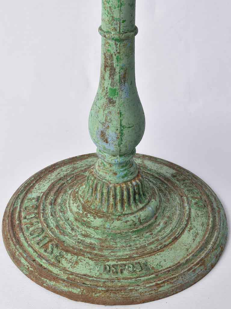 Antique French bistro table with green patina