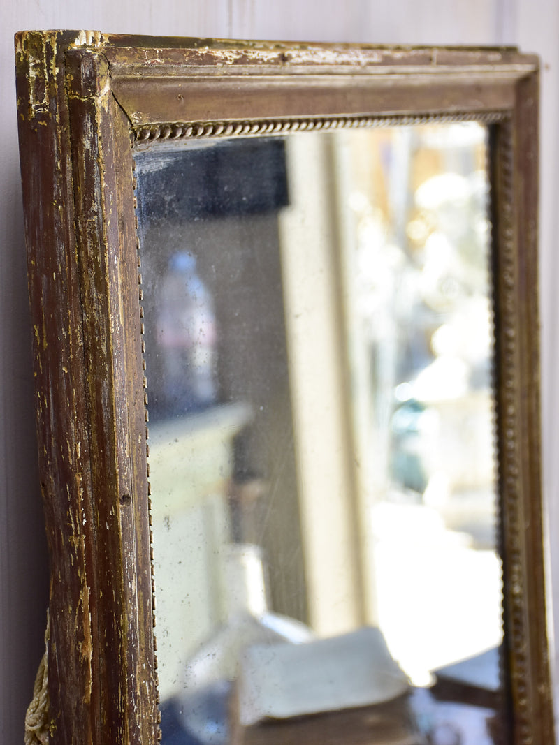 Rustic Louis XVI mirror with gilded frame 20” x 25 ½''