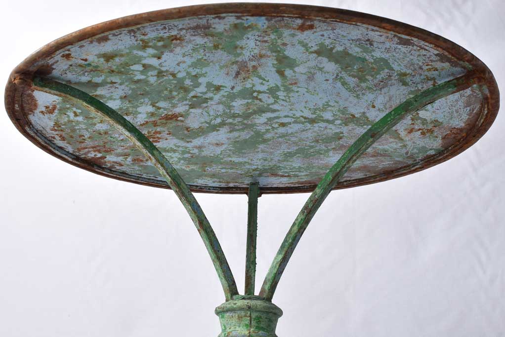 Antique French bistro table with green patina
