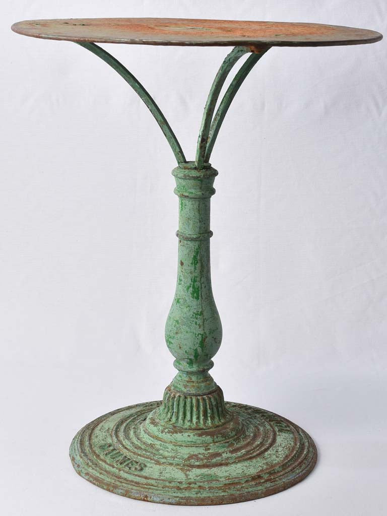 Antique French bistro table with green patina