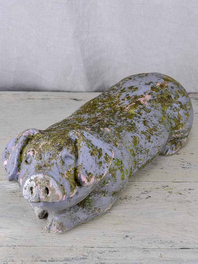 Antique French statue of a resting pig