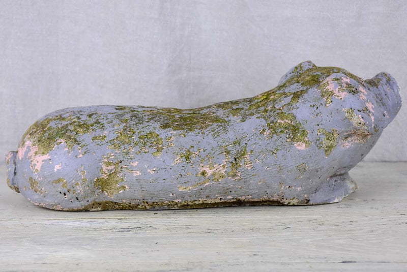 Antique French statue of a resting pig