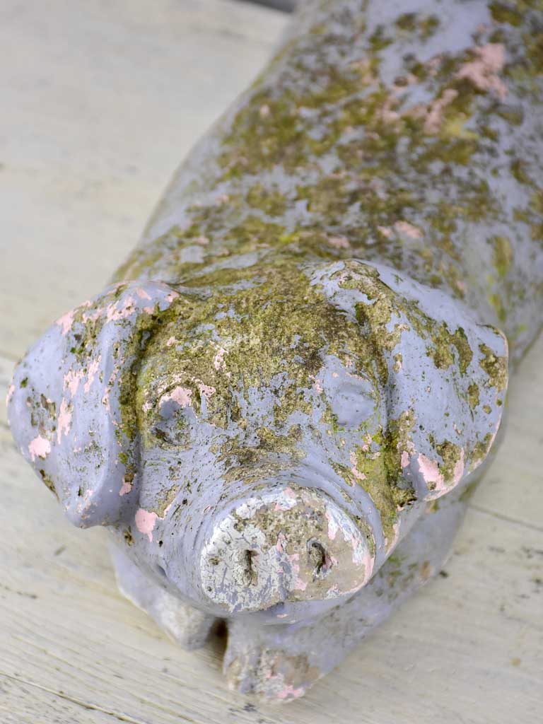 Antique French statue of a resting pig