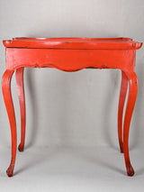 Louis XV table with side draw and red paint finish