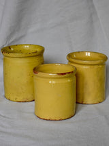 Collection of three antique French preserving pots with yellow glaze
