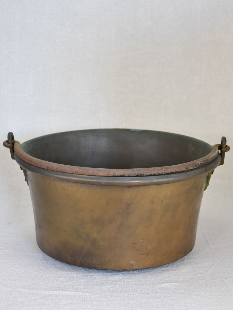 Broad French winemaker's copper with arching handle from the 19th century 17¼"