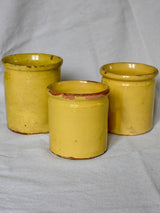 Collection of three antique French preserving pots with yellow glaze