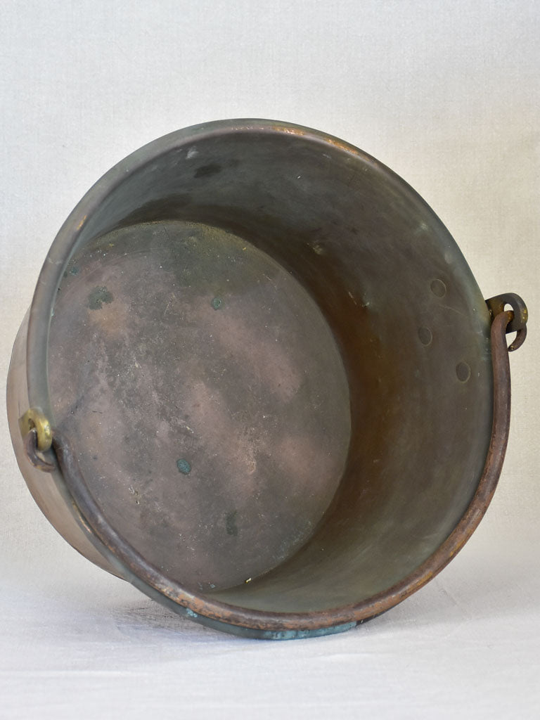 Broad French winemaker's copper with arching handle from the 19th century 17¼"