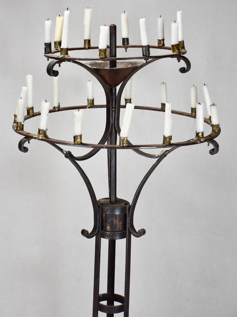 Ornate black iron 19th-century candelabra