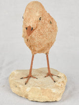 Artisan-made sculpture of a bird on a rock 8¾"