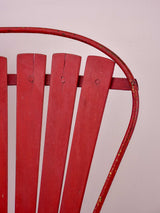 Rustic red painted garden chair