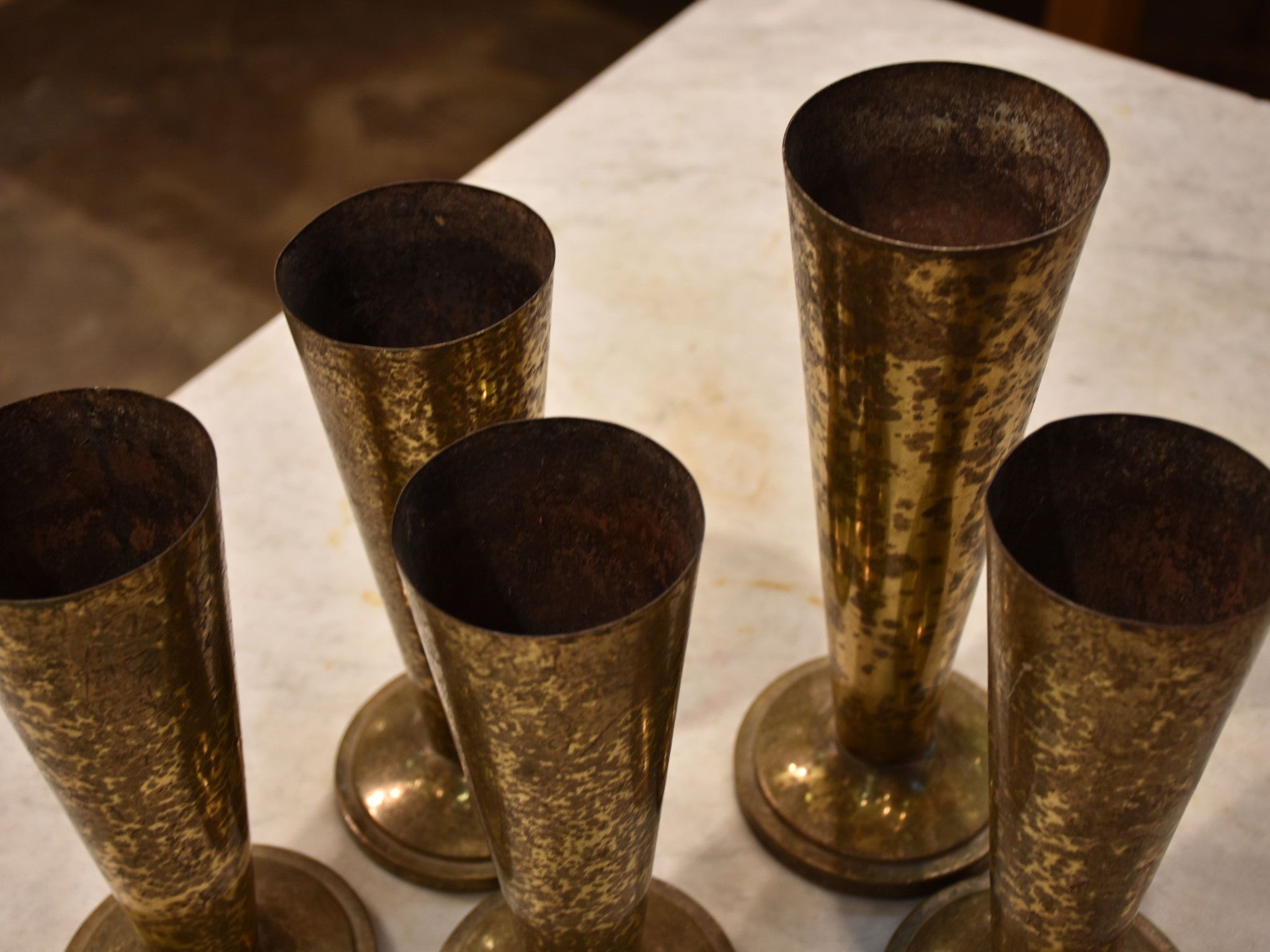 Set of three French florist vases with gold patina