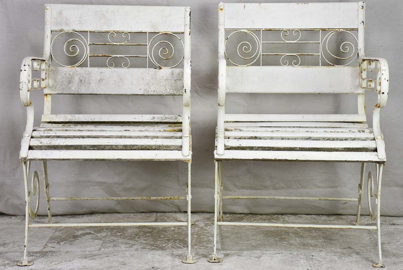Pair of white 1930's French garden armchairs from Vichy