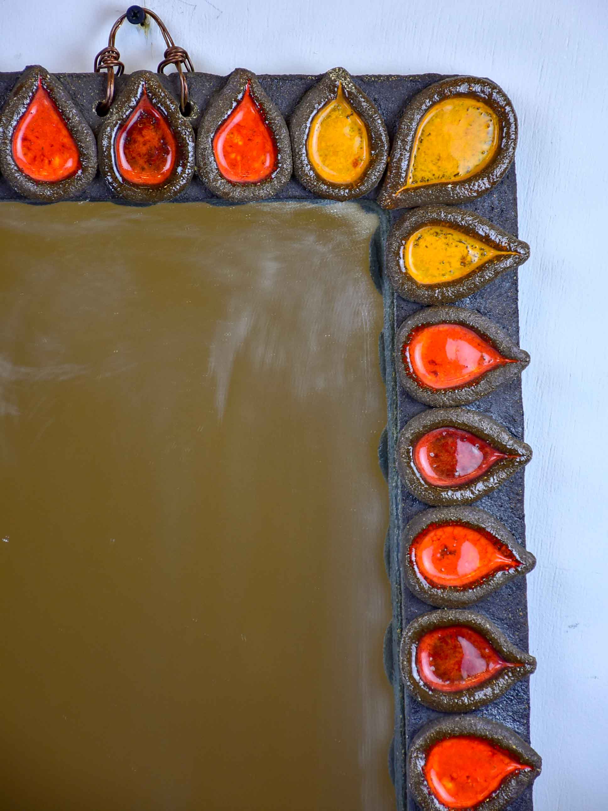 1960's Mid-Century flame mirror with fireclay frame 13” x 23 ½''