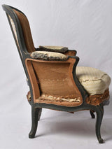 Fatigued upholstered Louis XV armchair