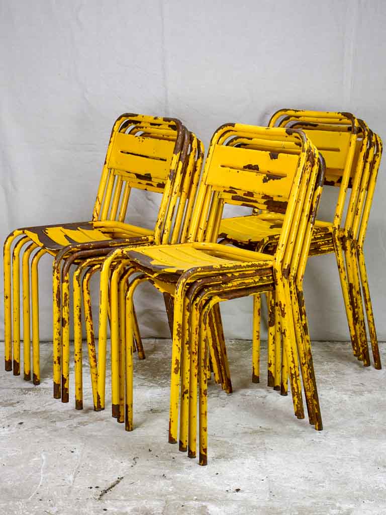 12 yellow metal 1950s Tolix chairs - stackable