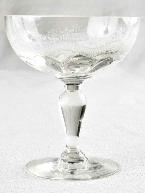 Elegant mid-century engraved champagne glasses