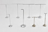 Collection of 8 antique jewelry display racks