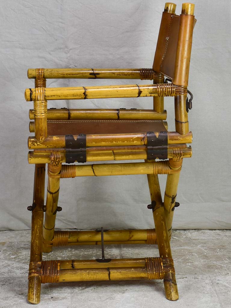 Antique folding bamboo and leather armchair