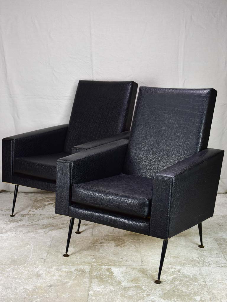 Pair of 1950's armchair faux black leather