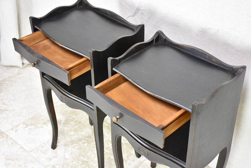 Pair of vintage Louis XV style French nightstands with black paint finish