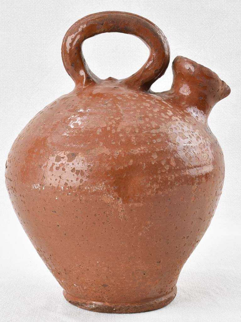 Antique Pyrenees oil pitcher, timeworn patina