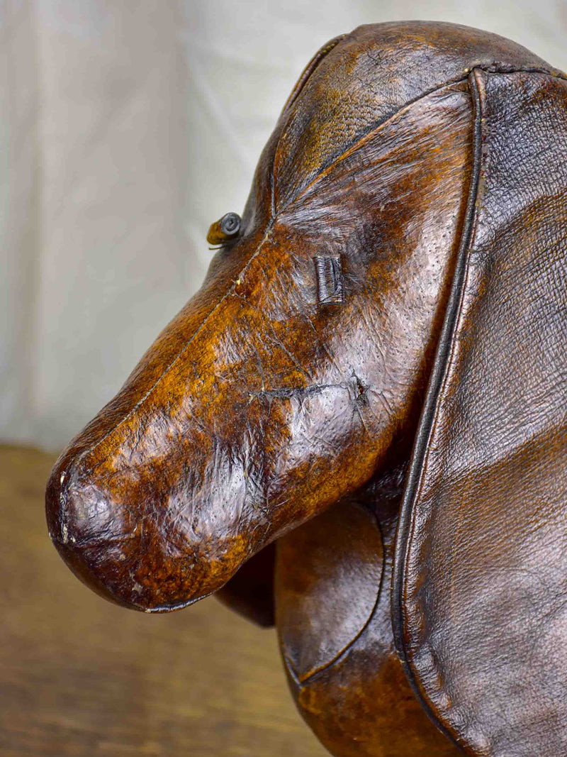 Antique Valenti leather dog footrest
