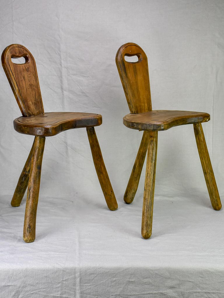 Pair of primitive milking stools with back rests