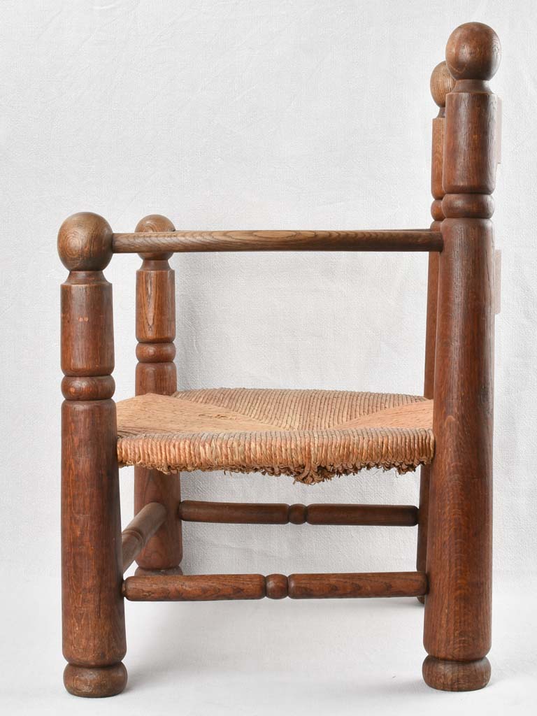 Wooden fireside armchair - Charles Dudouyt (1885 - 1946)
