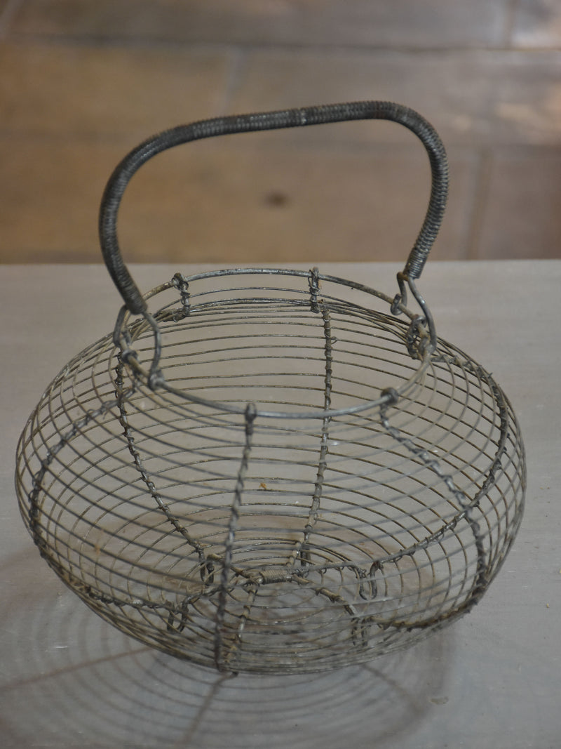 Two antique French wire baskets