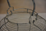 Two antique French wire baskets