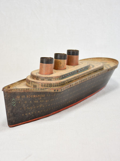 Biscuit tin in the shape of a ship from Normandy - 1930s 18"