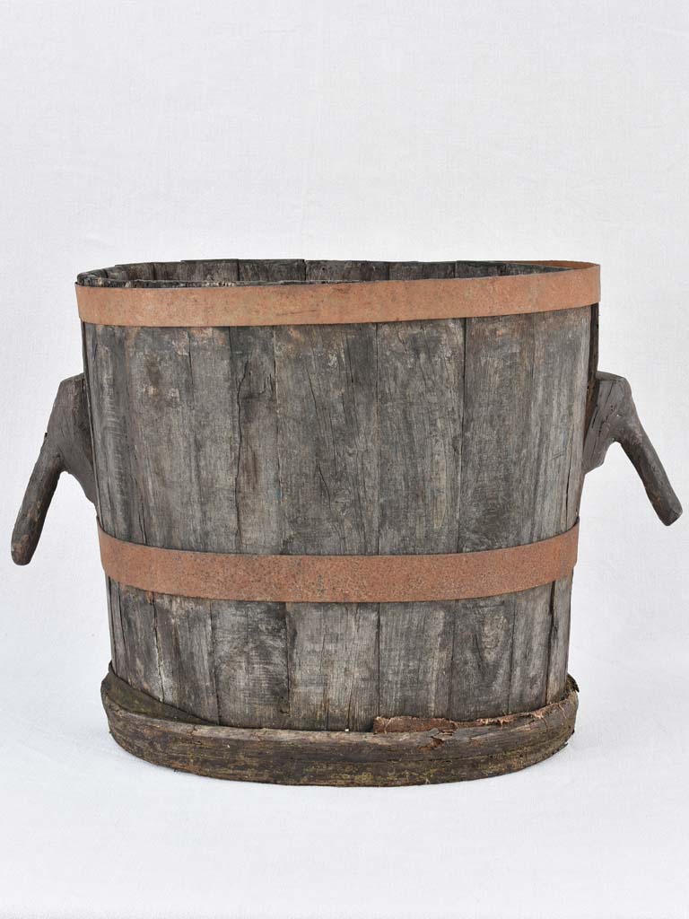 Vintage timeworn grape collecting barrel