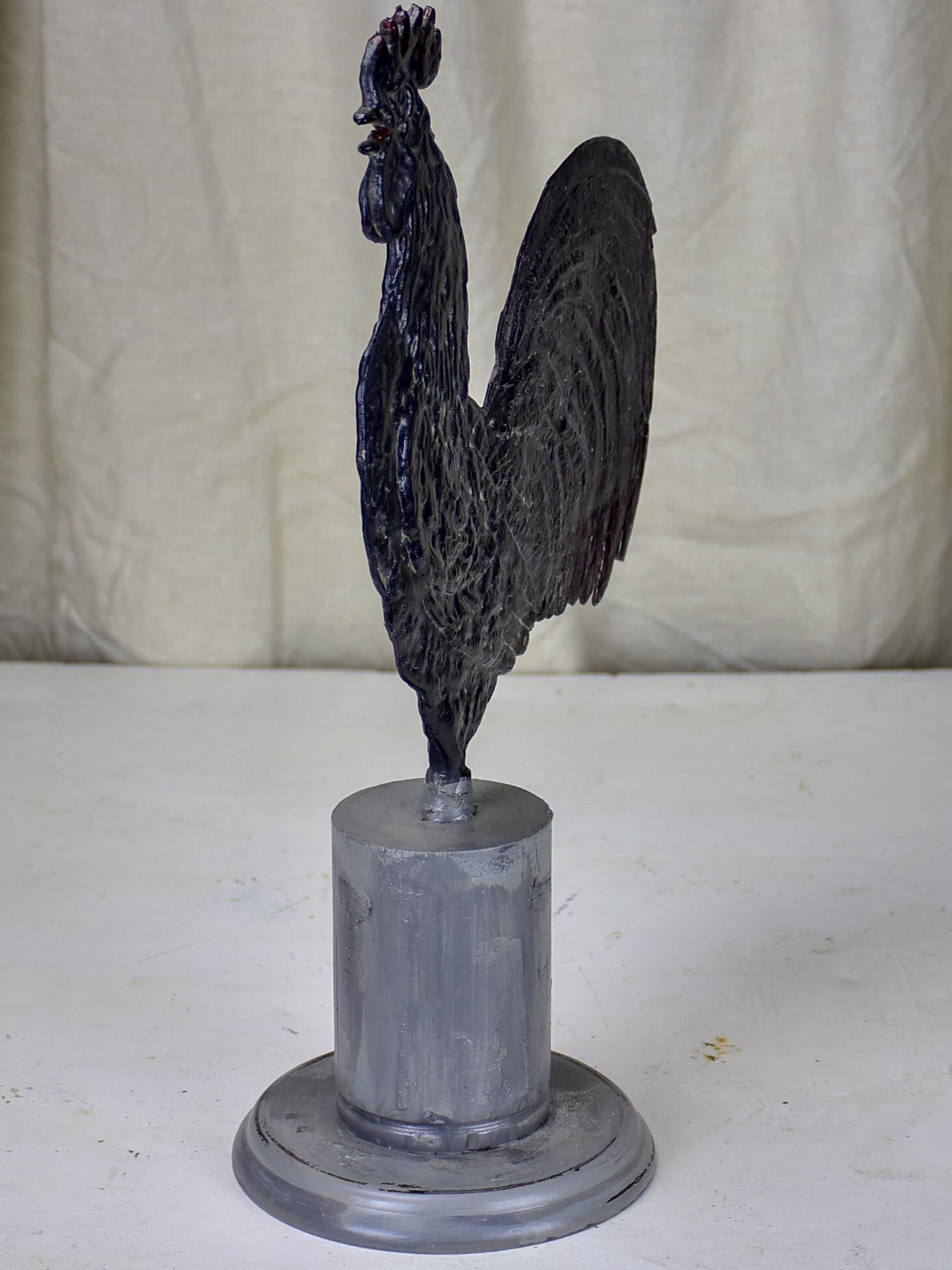 Vintage rooster mounted on a stand