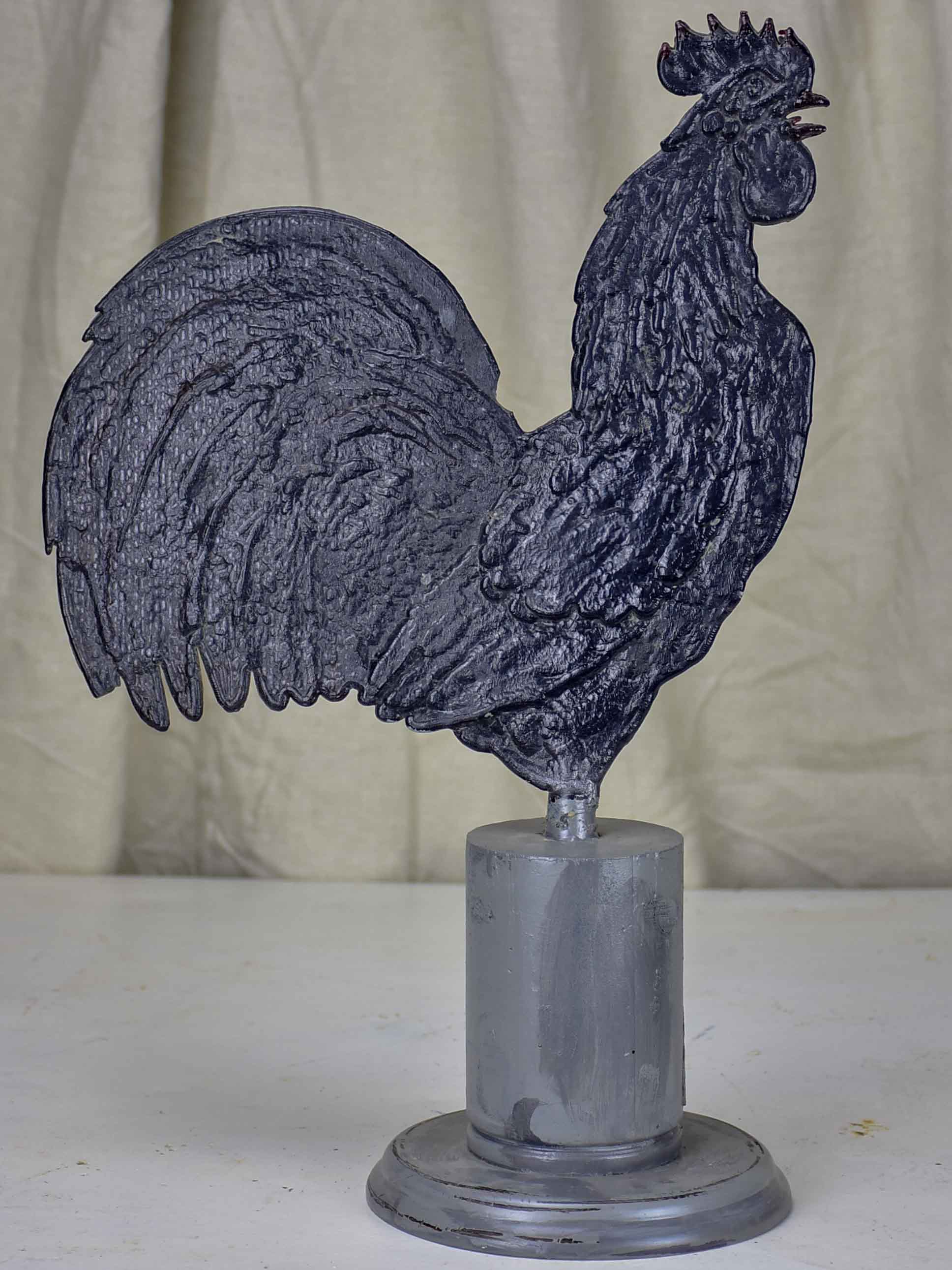 Vintage rooster mounted on a stand