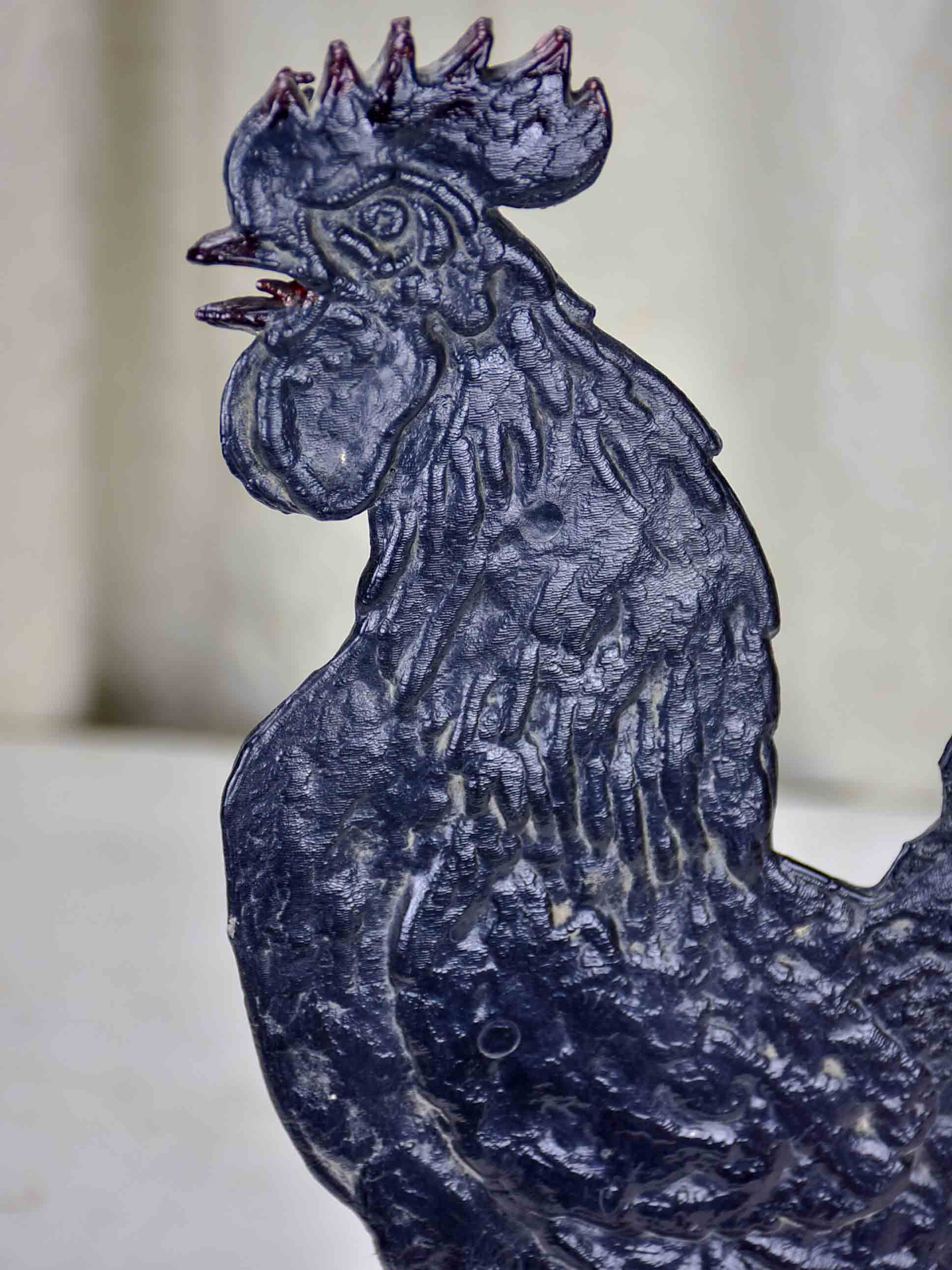 Vintage rooster mounted on a stand