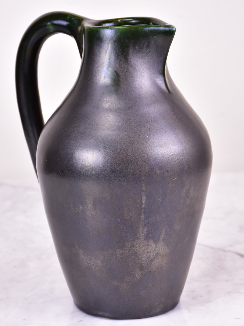 Black mid-century jug signed OUDIN