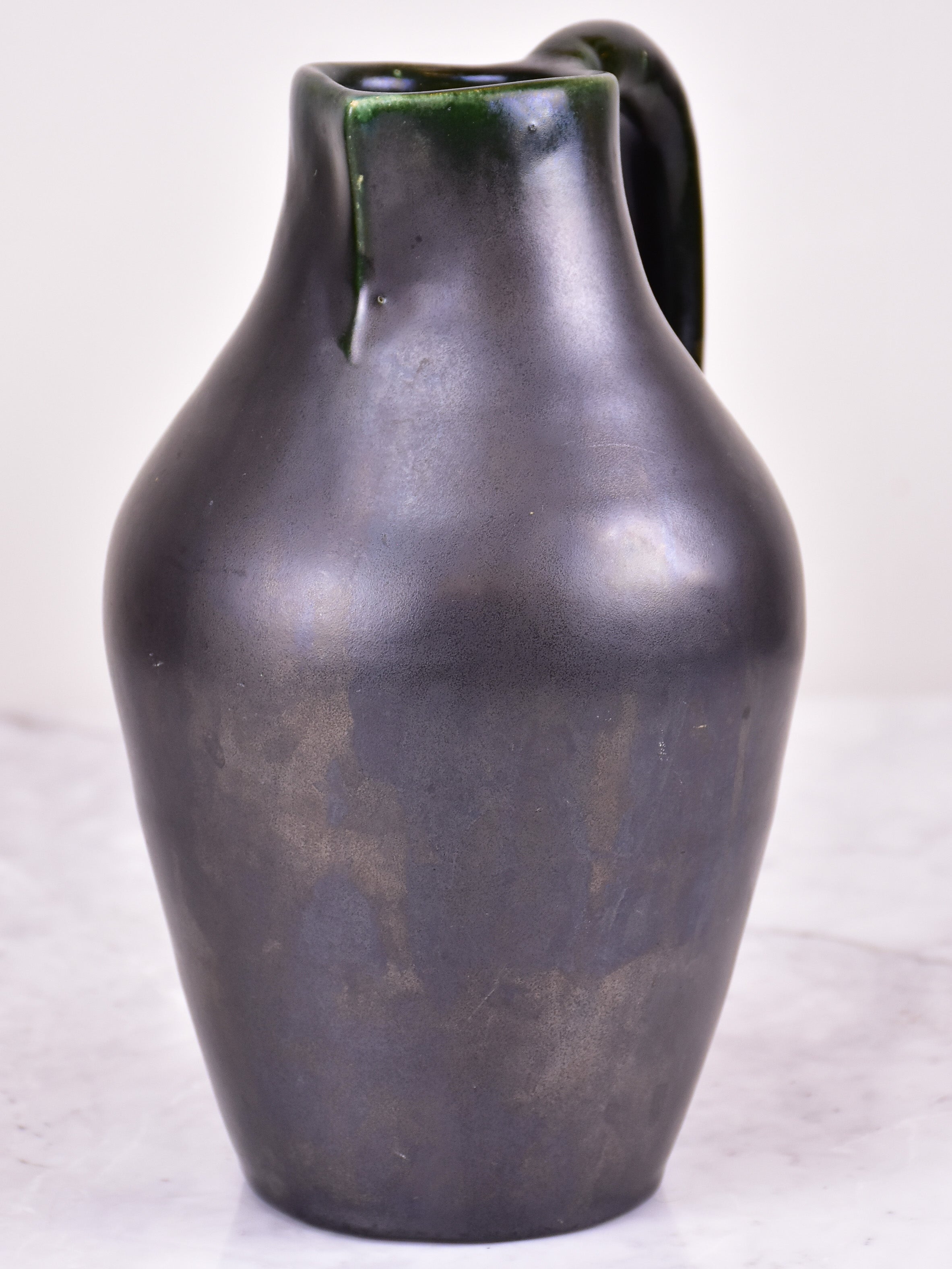 Black mid-century jug signed OUDIN