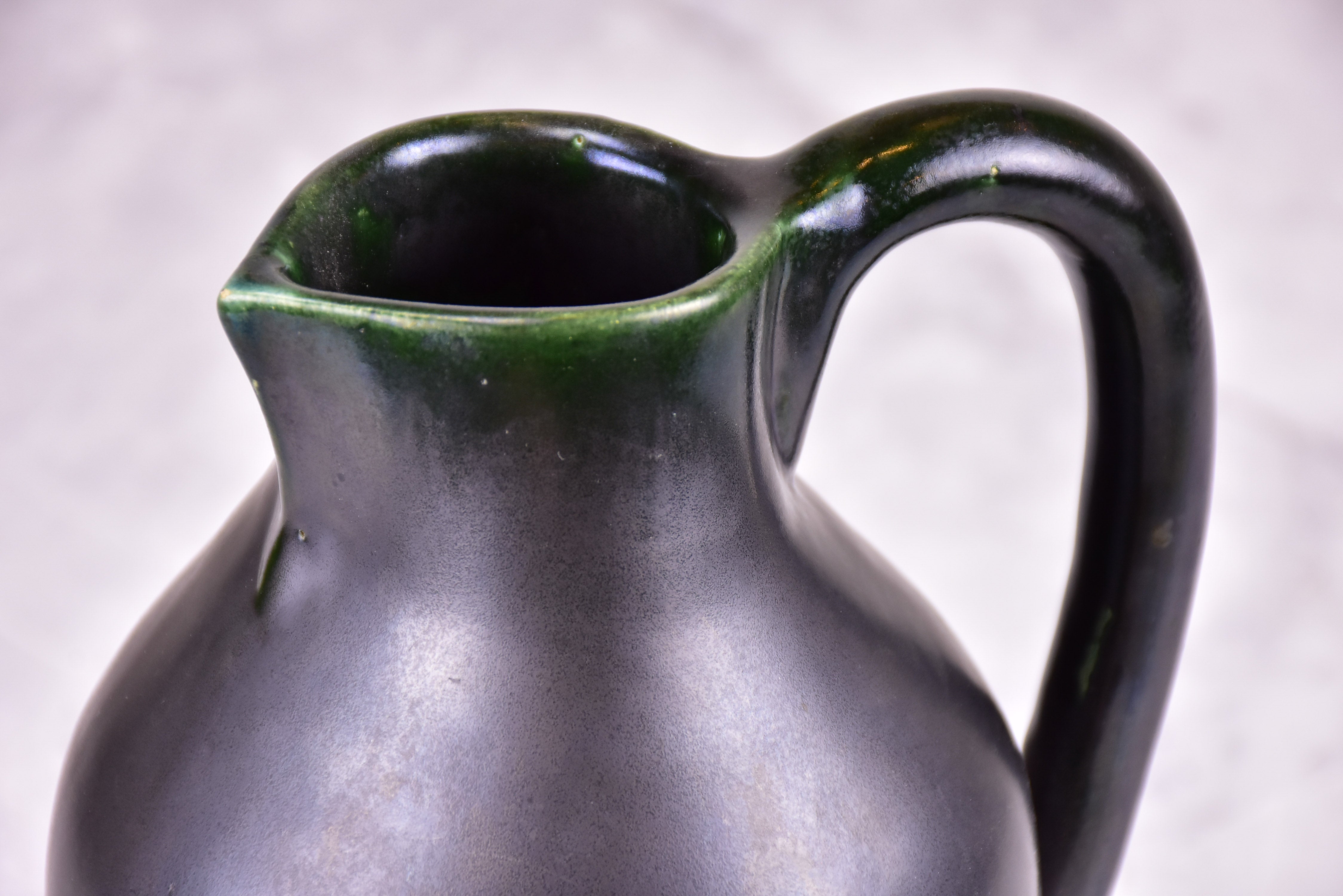 Black mid-century jug signed OUDIN
